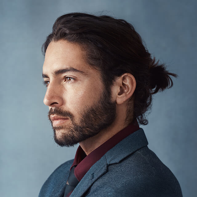 studio-shot-of-a-handsome-young-man-looking-though-2025-04-06-08-07-24-utc (1)